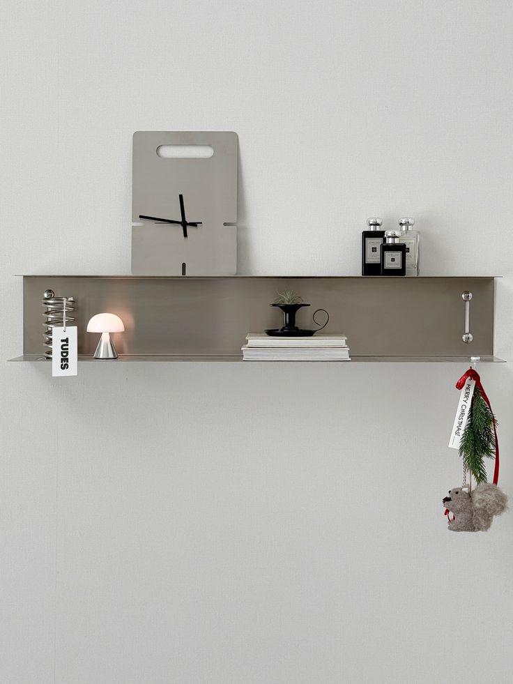 Chrome floating shelf