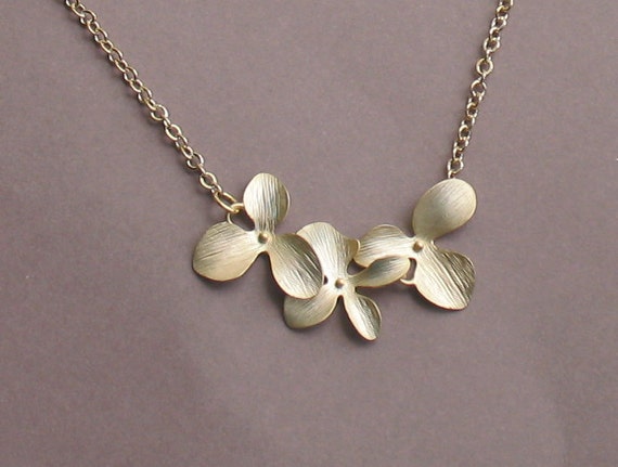 Items similar to Trio of Nested Orchids Gold Necklace - Free US ...