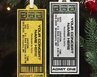 May include: Two glittery concert ticket ornaments. One is gold, the other silver. Both have the text "YOUR CONCERT NAME HERE", date, time, and location. The text "ADMIT ONE" is at the bottom. The text "CUSTOM CONCERT TICKET" is at the bottom.