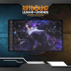 May include: A rectangular black playmat for the "Riftbound League of Legends Trading Card Game." The mat features a purple-haired character illustration and numbered zones. The game's logo is at the top.