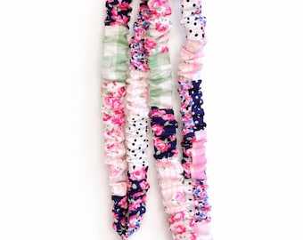 Coletero con diseño de patchwork floral en rosa, azul marino y verde salvia (cierre de seguridad opcional)