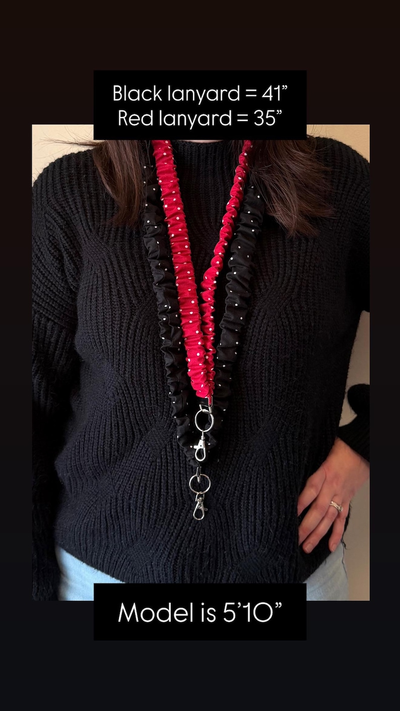 May include: Two fabric lanyards, one black with white polka dots and one solid red, both featuring a ruffled texture and silver-tone metal hardware. Text states: Black lanyard = 41 inches, Red lanyard = 35 inches, and Model is 5'10 inches.