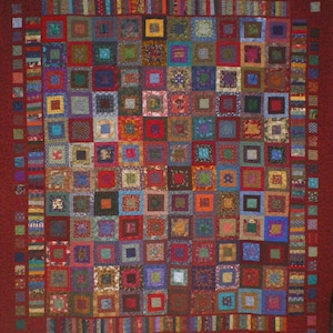 Scrappy Traditional Red and Many Colored Queen Size Log Cabin Variation