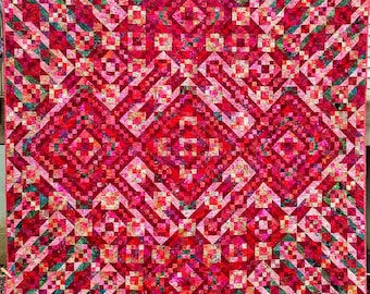 Queen Size Quilt in Red, pink and Green Batik Fabrics, Pieced using the Jacob's Ladder Block