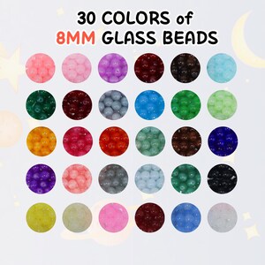 May include: A collection of 30 colors of 8mm glass beads, arranged in circular patterns. The beads are in various colors, including pink, purple, red, green, and blue. Text at the top reads "30 COLORS of 8MM GLASS BEADS."