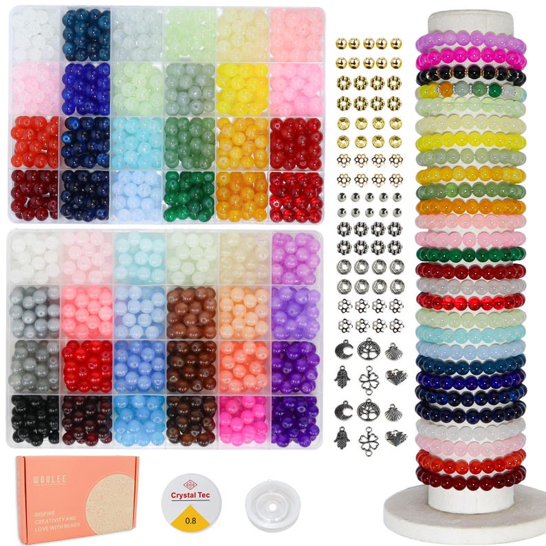 May include: A bead kit with a variety of colorful beads in a divided container, along with gold and silver-toned findings, and a display of beaded bracelets. The kit includes a box with the word "WARLEE" and the text "POSITIVE CREATIVITY AND LOVE WITH LIFE".