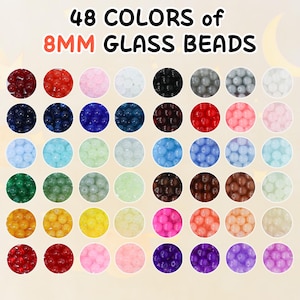 May include: A grid of 48 colorful 8mm glass beads. The beads are arranged in rows and columns, each in a different color, including red, blue, green, yellow, pink, and purple. Text at the top reads "48 COLORS of 8MM GLASS BEADS."
