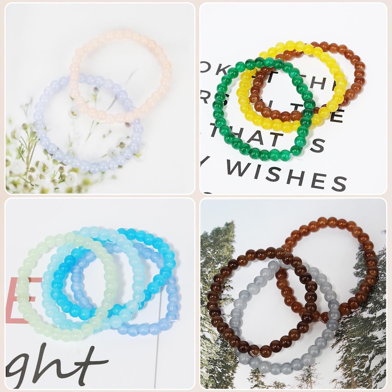 May include: A collection of beaded bracelets in various colors, including pink, lavender, light blue, green, yellow, brown, and gray. The bracelets are made of small, round beads and are arranged in sets of two or three.