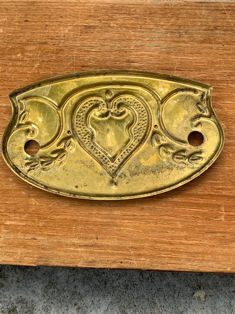 Antique metal drawer plate escutcheon