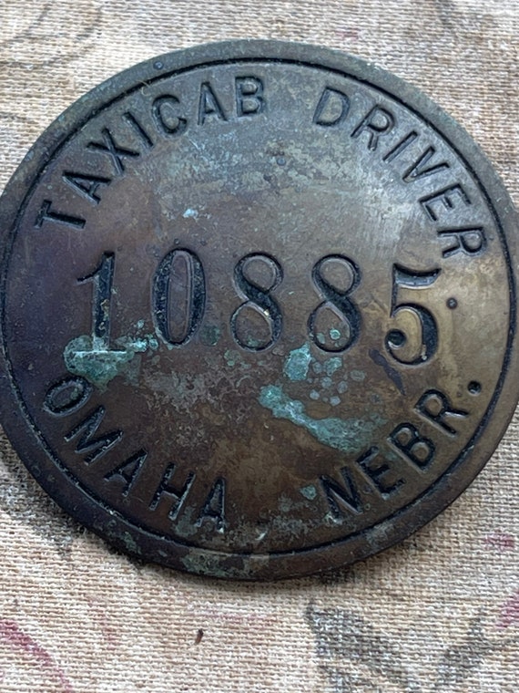 Antique taxi driver work badge