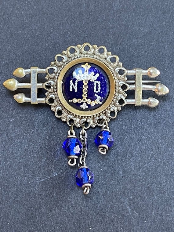 Antique French Notre Dame brooch