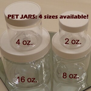 May include: Four clear plastic jars with white lids. The jars are labeled with their size in ounces: 2 oz, 4 oz, 8 oz, and 16 oz. The text "PET JARS: 4 sizes available!" is printed above the jars.