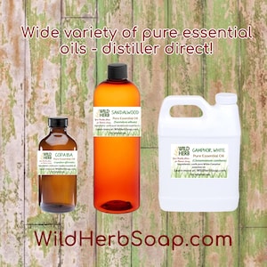 May include: Three glass bottles of essential oils with labels that say "Wild Herb" and the names of the oils: "Copaiba", "Sandalwood", and "Camphor, White". The bottles are on a wooden surface.