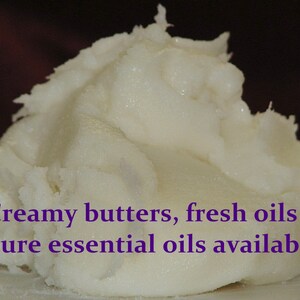 May include: A close-up of a white, creamy substance, likely a butter or balm. The text "Creamy butters, fresh oils & pure essential oils available!" is visible in the image.