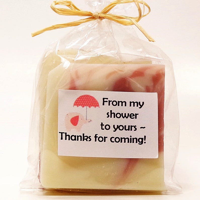 Pink White Sold in Sets Bulk Quantities Baby Girl Shower Favors Natural Soap in Clear Cello Sack with Adorable Clip Art /& Raffia Tie