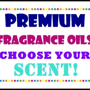 May include: A colorful sign with a dotted border reads "PREMIUM FRAGRANCE OILS CHOOSE YOUR SCENT!"