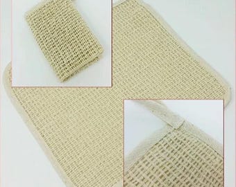 May include: A set of three natural loofah bath sponges with a woven texture. The sponges are beige and have a white trim. The sponges are shown in different positions, including folded, flat, and hanging.