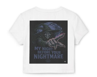 May include: White crop top featuring a graphic of a witch pointing, with the text "MY NIGHT BEFORE YOUR NIGHTMARE". The witch is wearing a hat and is set against a dark blue background with a full moon.