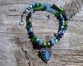 Stone,metal,glass beaded necklace 20 inch,pendant 1 1/2 inch