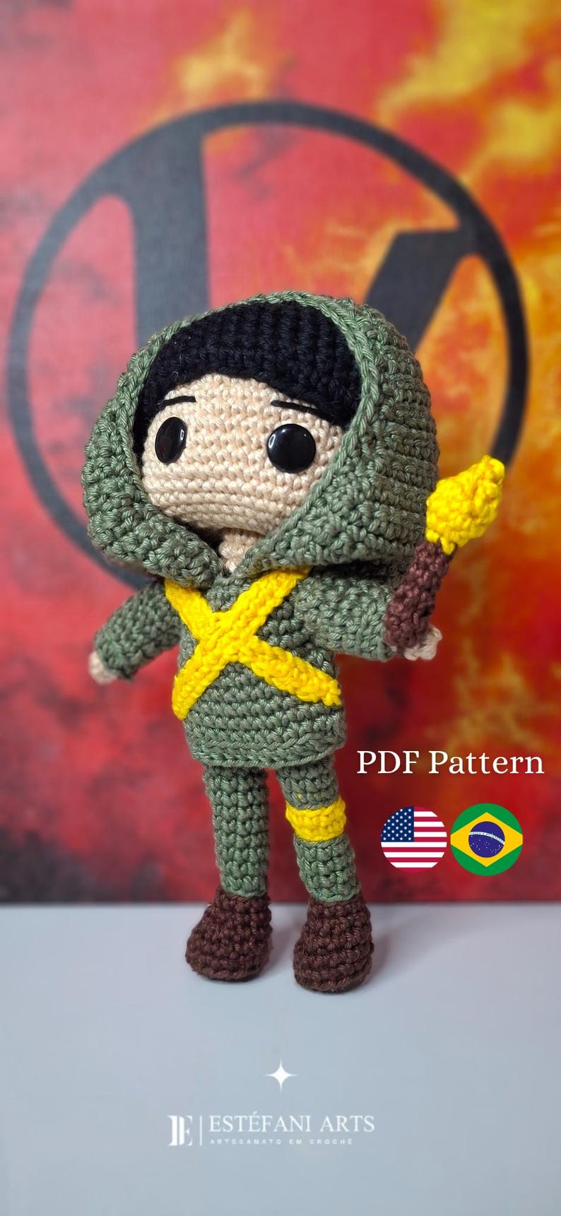 May include: Crocheted doll wearing a green hooded outfit with a yellow cross design and brown boots, holding a yellow torch. The doll has black hair and large black eyes. Text on the image reads "PDF Pattern".