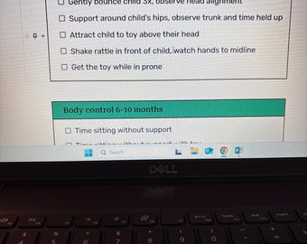 May include: A laptop screen displays a document with a checklist titled "Body control 1-5 months" and "Body control 6-10 months." The checklist includes instructions for observing a child's development. The laptop's keyboard is visible below the screen.