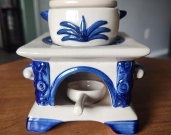 Calentador de cera tipo vela de té, difusor de aceites esenciales, estilo pagoda de cerámica azul y blanca vintage.