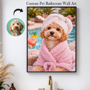 May include: A framed wall art print featuring a dog wearing a pink robe and a white towel on its head. The dog is sitting near a pool with a cocktail. The text "Custom Pet Bathroom Wall Art" is at the top.