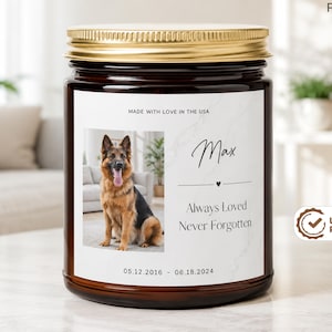 May include: A brown glass candle jar with a gold lid and a white label featuring a photograph of a German Shepherd dog. The label includes the text Max, Always Loved Never Forgotten, 05.12.2016 - 06.18.2024, and Made with love in the USA.