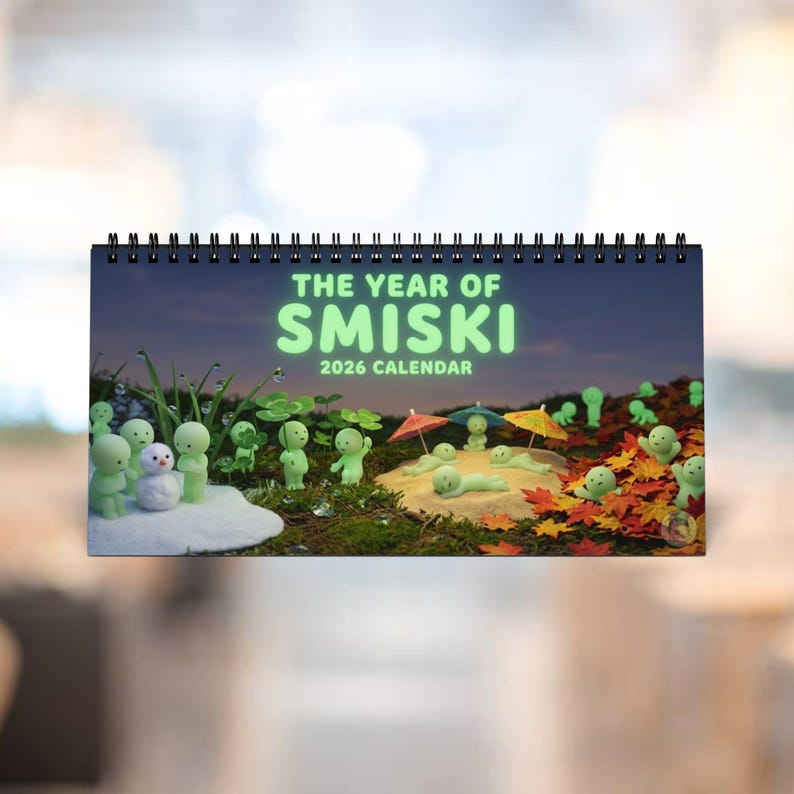 Bring the joy of unboxing to your daily routine with this 2026 Smiski Inspired Desk Calendar! Featuring 12 months of cute, whimsical, mini figurine art, this unique calendar is the perfect kawaii accessory for your desktop or office.