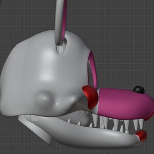 May include: A 3D-rendered model of a stylized animal head, featuring a gray skull-like structure with a pink snout and red accents. The model has sharp white teeth and a black nose, with a gray and pink ear.