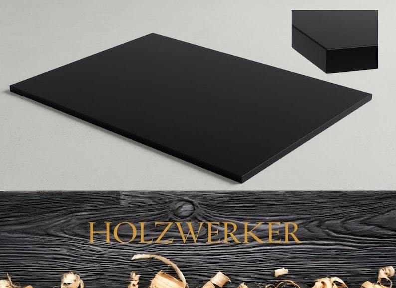 May include: A rectangular, black wooden tabletop with a glossy finish. The image includes a close-up of the edge, showcasing the thickness. The word "HOLZWERKER" is displayed in gold lettering on a wood grain background.