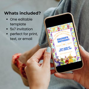 May include: A smartphone displays a colorful birthday invitation featuring Teletubbies characters. The invitation includes the text "Colton's Birthday!" with date, time, and address details. The phone is held by a person.