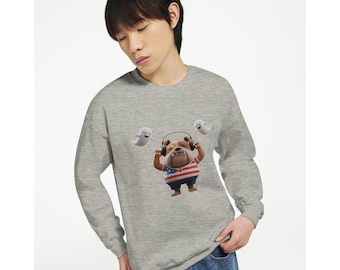 May include: A light gray sweatshirt featuring a cartoon bulldog wearing headphones and an American flag shirt. Two white ghost figures float on either side of the bulldog. The sweatshirt has long sleeves.