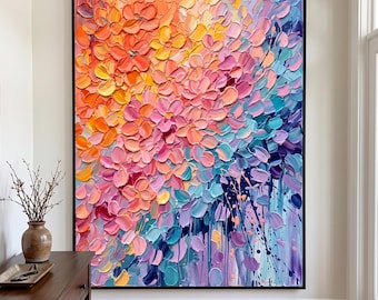 May include: A large rectangular canvas painting featuring a dense, textured floral composition created with thick impasto paint strokes. The color palette transitions from warm orange, yellow, and pink tones to cool blue, purple, and teal hues.