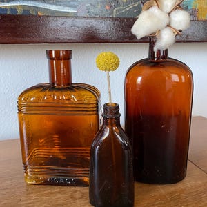 Vintage Antique Trio of Amber Brown Glass Bottles