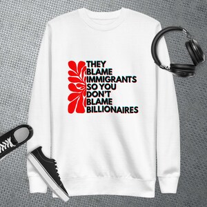Blame Billionaires not Immigrants: Unisex Premium Sweatshirt