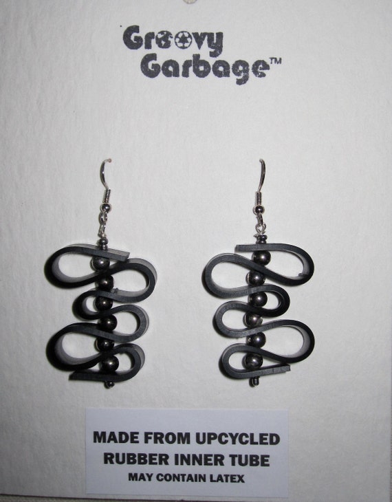 Items similar to Upcycled Inner Tube Earrings with salvaged metallic