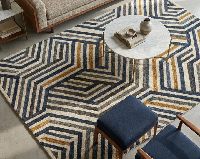 Hand-Tufted Gold/Brown modern rug with a textured new pattern.