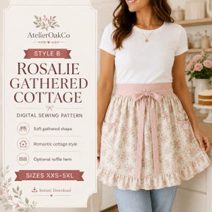 May include: A digital sewing pattern for a Rosalie Gathered Cottage apron, featuring a floral print with pink flowers on a cream background, a wide waistband with a tie, two pockets, and a ruffled hem, available in sizes XXS-5XL.