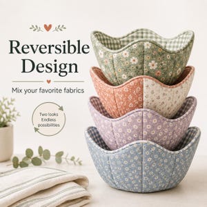May include: A stack of four fabric bowls with scalloped edges, featuring various floral patterns in green, terracotta, lavender, and blue. The text reads Reversible Design, Mix your favourite fabrics, and Two looks Endless possibilities.