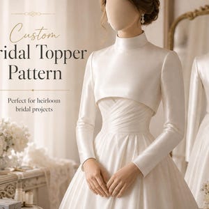 May include: A white bridal topper with long sleeves and a high neckline, worn over a strapless gown. The text reads: Custom Bridal Topper Pattern. Perfect for heirloom bridal projects. The garment features a smooth, satin-like finish.