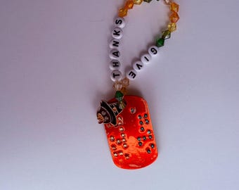 Braille Freundschafts Armband mit der Aufschrift bedankt sich in zusammengezogener Blindenschrift.