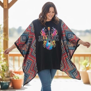 May include: A black poncho-style top featuring a central graphic of a colorful guitar with wings and the text JELLY ROLL. The garment has wide, flowing sleeves with a vibrant, multi-colored geometric pattern in shades of red, blue, and orange.