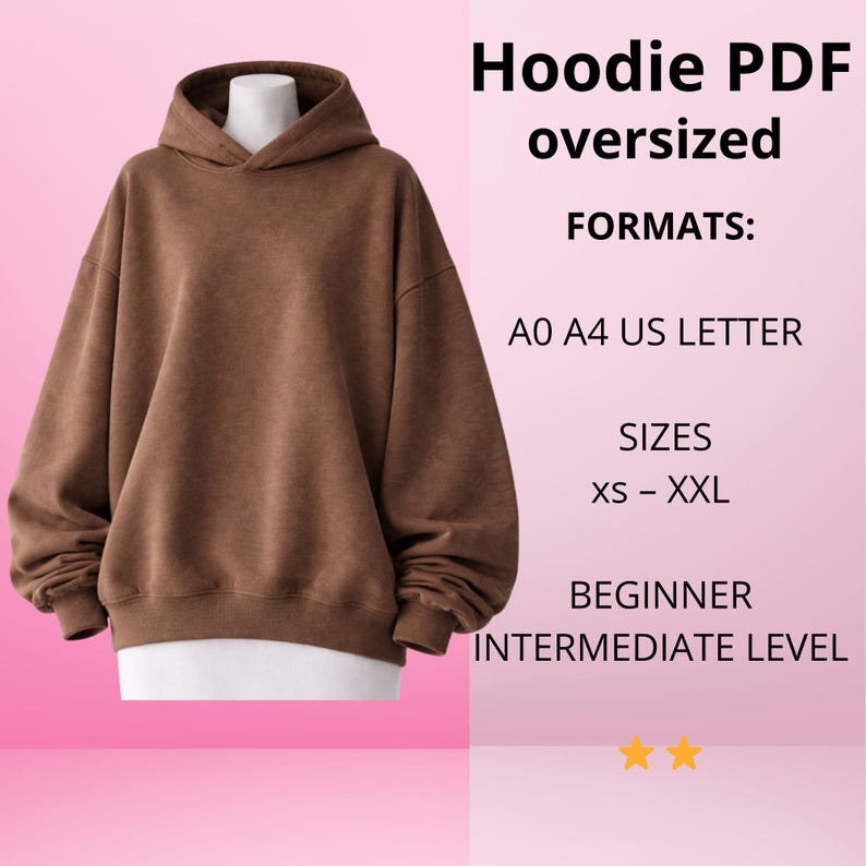 May include: A brown oversized hoodie displayed on a mannequin. The hoodie has a hood and long sleeves. Text on the right side reads "Hoodie PDF oversized" and lists formats, sizes, and skill levels.