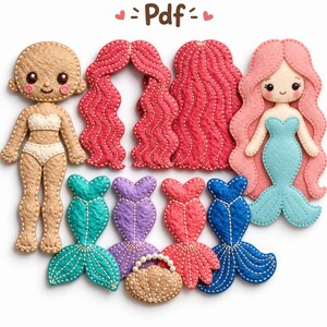May include: A felt doll set featuring a tan doll body, two wavy red hair pieces, a mermaid doll with pink hair and a blue tail, four colorful mermaid tails in teal, purple, pink, and blue, and a small tan shell purse with white beads.