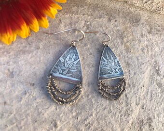 Silver bamboo printed dangly earrings