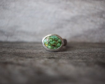 Natural Sonoran gold turquoise oval minty green with hammered sterling silver band