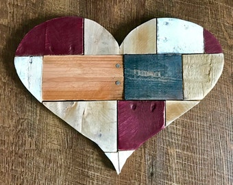 Wooden heart wall hanging with a touch of burgundy. Happy Valentine's Day, patchwork style, reclaimed wood rustic modern farmhouse decor