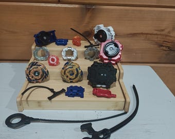 Pacote com 2 Beyblades e diversos acessórios Takara Tomy B-79 Drain Fafnir
