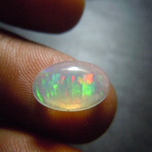 AAA etiopisk opal cabochon 9 x 11 mm oval – prålig naturlig Welo-opal ädelsten för ringinfattning bild 5